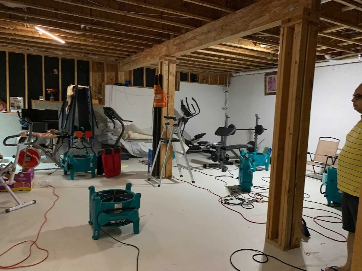 Basement drying equipment setup for Contents Cleaning & Restoration in Beardstown